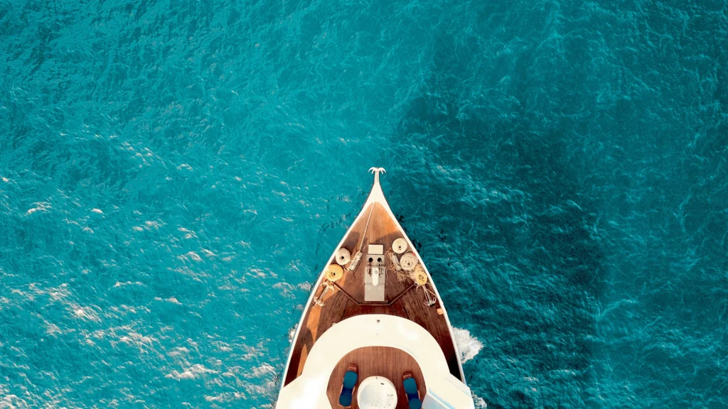 bow of ship on water from above
